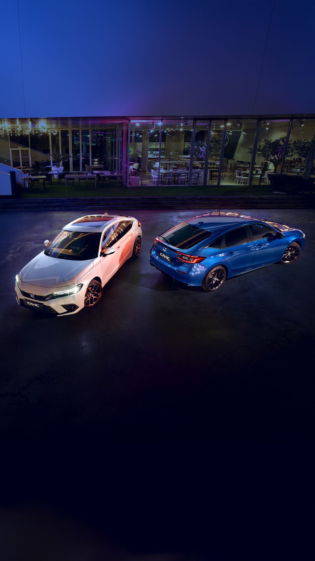 Nouvelle Honda Civic berline exposée de nuit – Garage Majestic SA, concessionnaire Honda à La Tour-de-Trême, canton de Fribourg